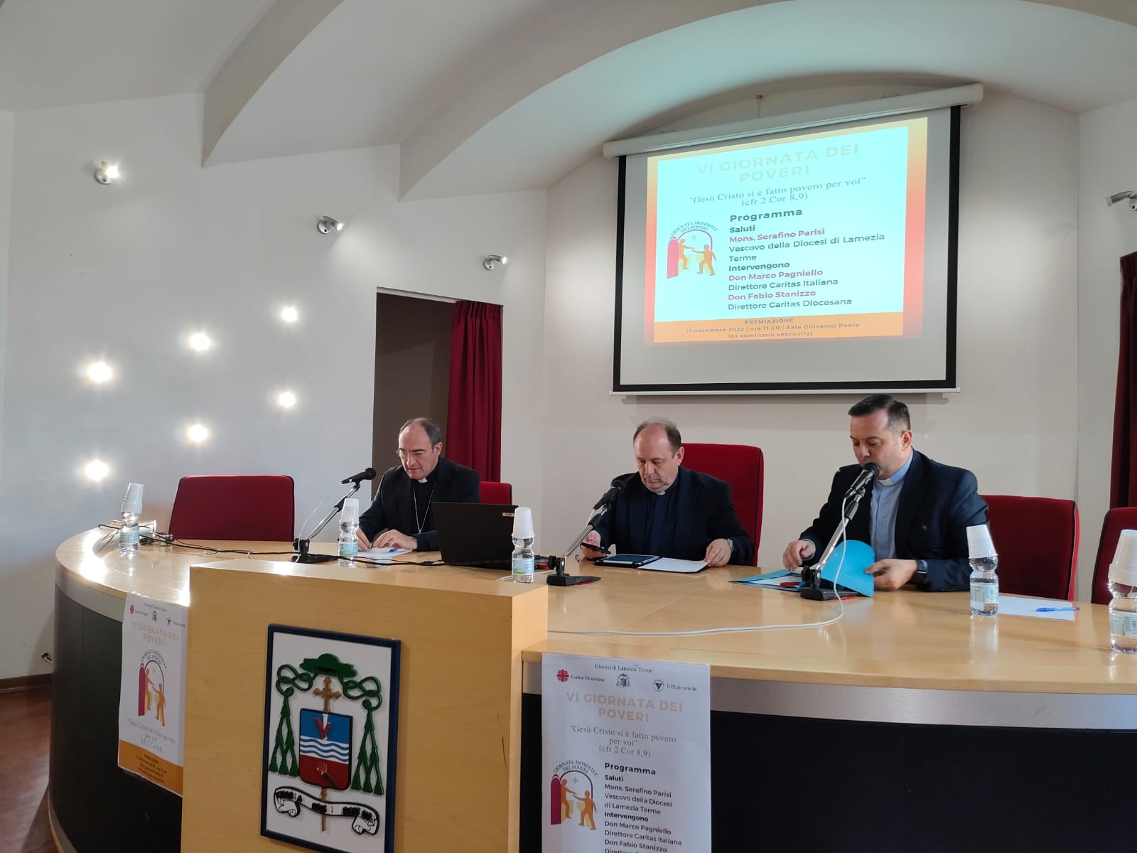 da sx parisi, pagniello, stanizzo premio caritas 2022